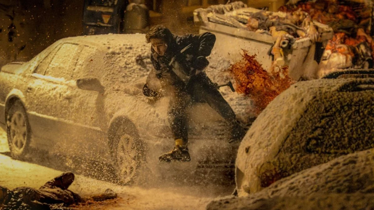 Austin Abrams Finds Clue as Zombies Rain in New Resident Evil Clip